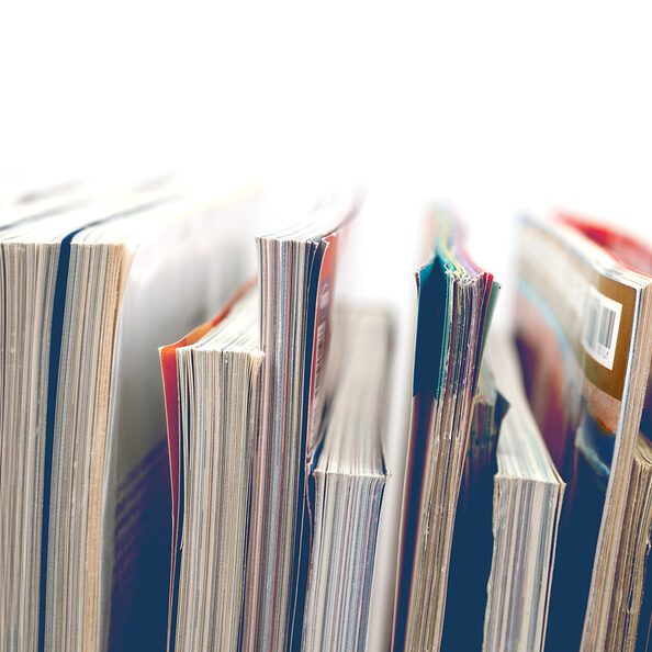 Motivbild Bücher und Zeitungen